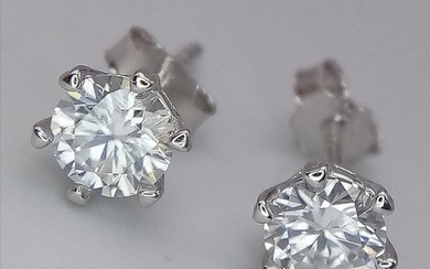 A Pair of Sterling Silver Moissanite Stud Earrings. 0.5ctw, ...