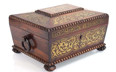 A Regency rosewood and brass inlaid jewellery box of sarcophagus...