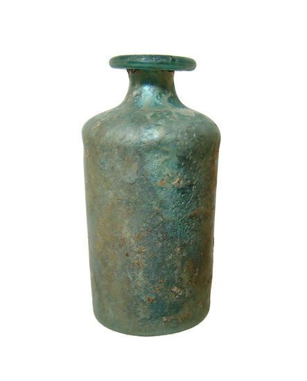 A Roman blue-green glass cylindrical bottle
