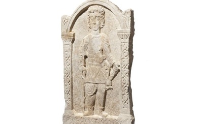 A Roman marble gravestone of a venator, 3rd century A.D.