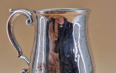 A SILVER HALF PINT MUG BY WILLIAM GRUNDY, LONDON 1754, THE BALUSTER SHAPE INITIALLED OPPOSITE THE