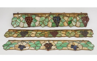 A Set of Three Slag Glass Decorative Panels.