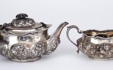 A Victorian Silver Oval Teapot and Two-Handled Sugar Basin,...