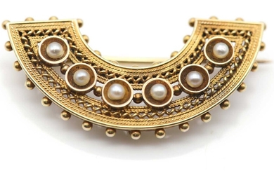 A Victorian gold pearl set crescent brooch