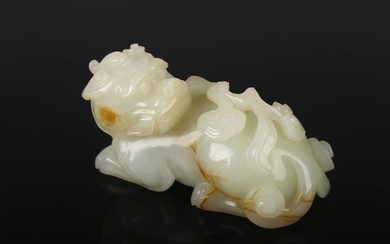 A WHITE JADE MYTHICAL BEAST AND LINGZHI