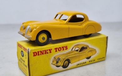 A boxed Dinky Toys No.157 yellow Jaguar XK120, Nr M-M, box E...