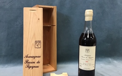 A boxed 1943 vintage bottle of Baron de Sigognac Armagnac,...