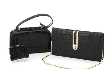 SOLD. A collection comprising of two bags and a wallet of black alligator skin with gold tone hardware. (2) – Bruun Rasmussen Auctioneers of Fine Art