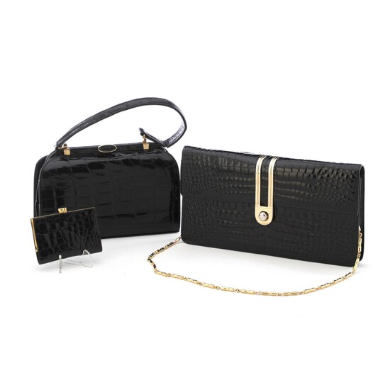 SOLD. A collection comprising of two bags and a wallet of black alligator skin with gold tone hardware. (2) – Bruun Rasmussen Auctioneers of Fine Art