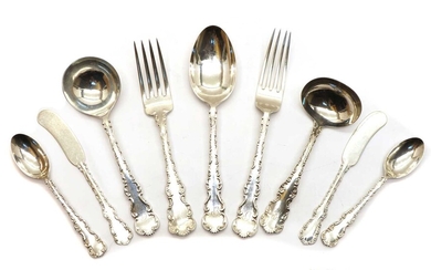 A composite English silver and Canadian white metal and metalware table service