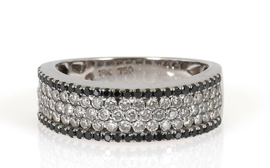 A diamond ring set with numerous white and black brilliant-cut diamonds, mounted...