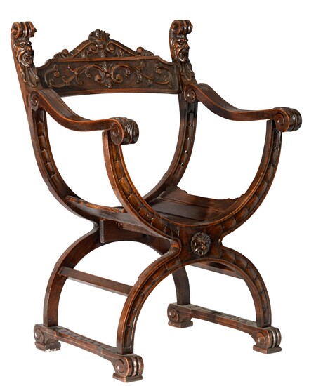A finely carved walnut Renaissance Revival Dante armchair, H 86 - W 54 cm