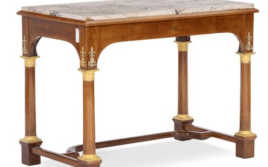 A freestanding Empire style mahogany and gilt bronze mounted table with stone...