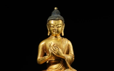 A gilt-copper alloy figure of Shakyamuni Buddha, Qing dynasty, circa 18th century