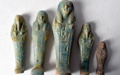 A group of Egyptian glazed pottery Sarcophagus figures. Largest 15cm (5).