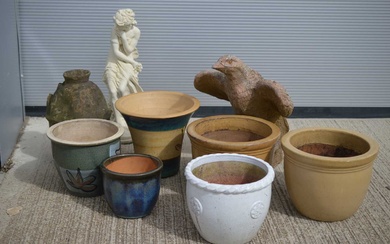 A group of glazed terracotta garden pot and various ornaments