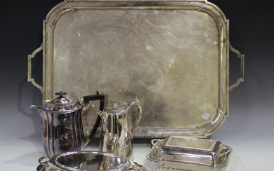 A group of plated items, including a two-handled tea tray, two entrées dishes and covers, a cir