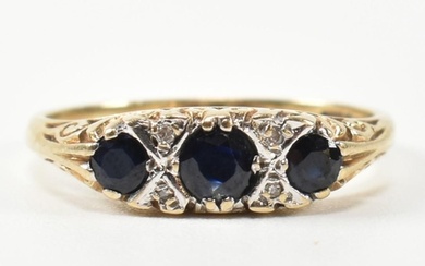 A hallmarked 9ct gold, diamond and sapphire half hoop ring. ...