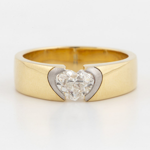 A heart-shaped diamond ring, with report.