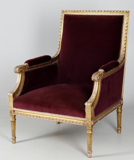A late 19th century French carved giltwood armchair