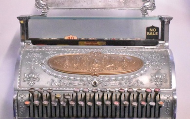 A late 19th/early 20th century chrome plated cash register...