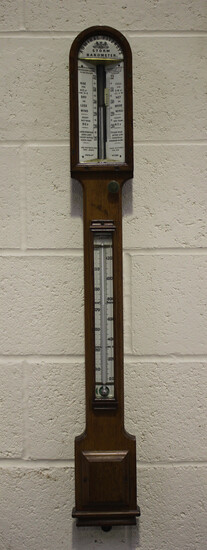 A late Victorian pale oak Admiral Fitzroy's storm stick barometer, the ceramic dial with vernie