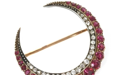 A late Victorian ruby and diamond closed crescent brooch