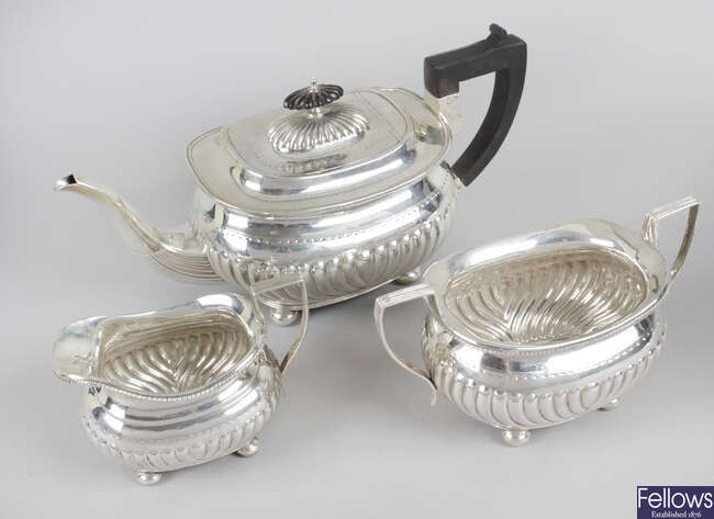 A late Victorian silver three piece tea service.
