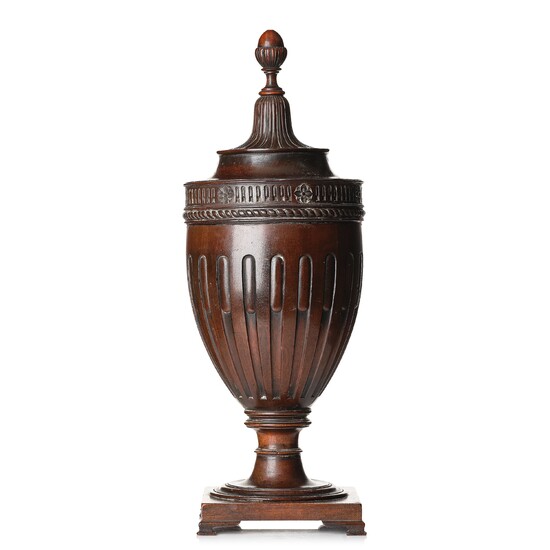 A mahogany carved Urn Cutlery box in George III style, around year 1800.