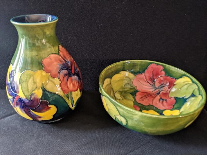A matching green floral Moorecroft vase and bowl