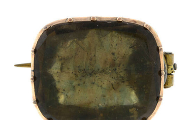 A mid 19th century gold foil-back quartz brooch.
