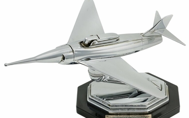 A most attractive chrome desk lighter of 1960's manufacture, modelled as a jet fighter aircraft...