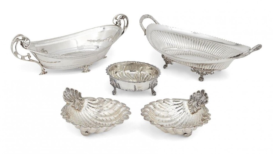 A navette-shaped Victorian silver dish, Sheffield, c.1897, James Dixon & Sons, the bifurcated foliate twin handles to pierced sides repousse decorated with garlands, 33cm long, together with a Victorian silver sugar bowl, London, c.1864, Beare...