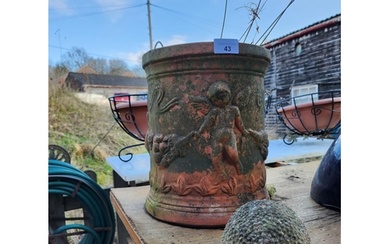 A nice decorative terracotta plant pot with cherub. 28cm tal...