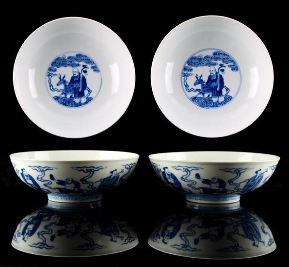 A pair of Chinese blue & white Immortals bowls,...