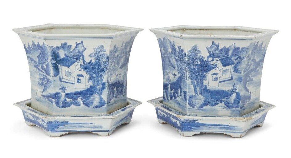 A pair of Chinese blue and white hexagonal jardinieres with stands, 18th century, each standing on bracket shaped feet with everted rim, painted to the exterior with figurative watery landscape scene, base unglazed with a hole, 24cm high, 34.5cm...