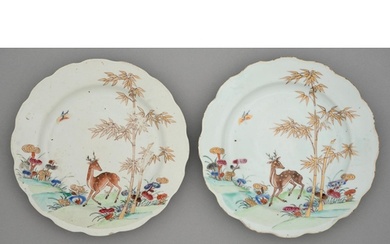 A pair of Chinese famille rose plates, 18th c, enamelled wit...