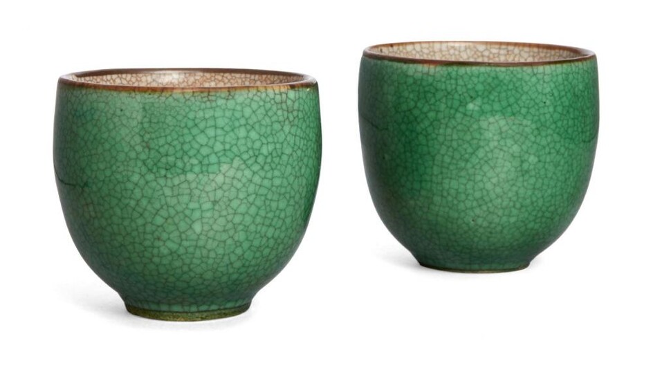 A pair of Chinese porcelain apple-green glazed...