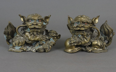 A pair of FO DOGS/LUCKY CHARMS - China, yellow cast.