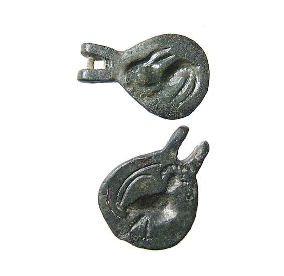 A pair of Late Roman/Byzantine hinged bronze seals
