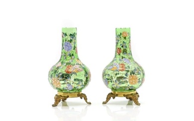A pair of Moser green glass and gilt-metal bottle vases