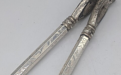 A pair of Victorian silver mounted nutcrackers, hallmarked London,...