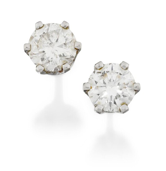 A pair of diamond single stone ear studs, each diamond weighing approximately 0.20 carats mounted in a six-claw setting, post fittings, unmarked