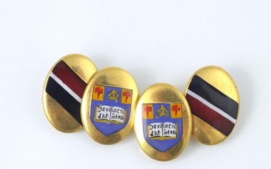 A pair of gold plated cufflinks, the oval links with enamell...