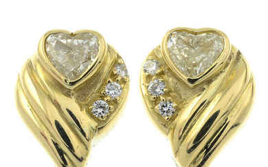 A pair of heart-shape diamond and brilliant-cut diamond earrings.