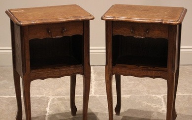 A pair of oak veneered French style bedside cabinets, late 2...