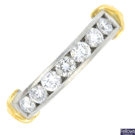 A platinum brilliant-cut diamond ring.