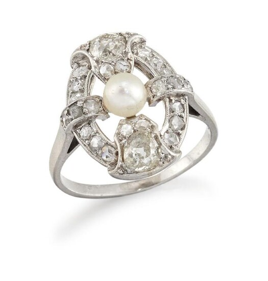 A platinum, diamond and pearl oval cluster...