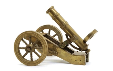 A scratch built brass model of a field cannon or Maxim gun