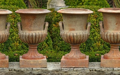 A set of four terracotta vases